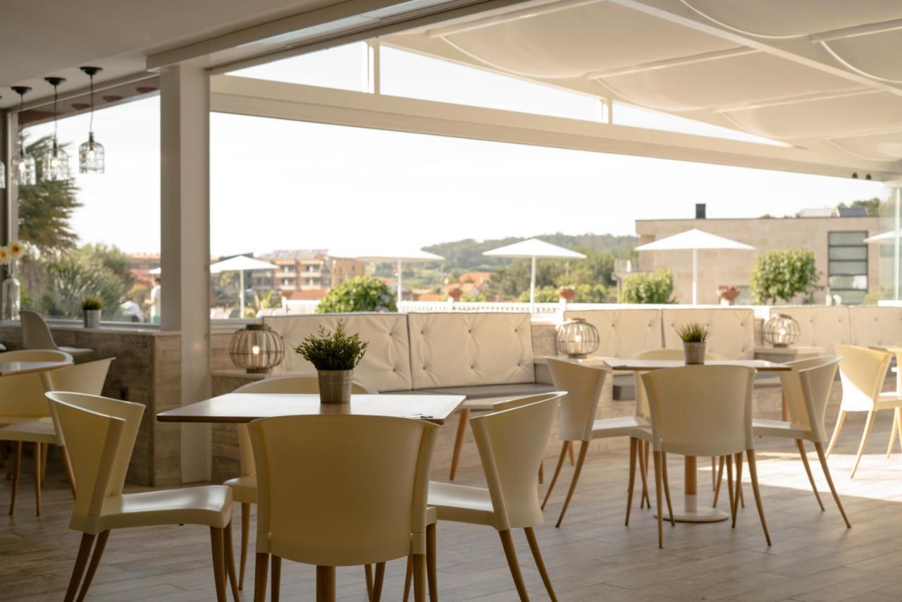 Hotel Piramide Portonovo Exterior photo